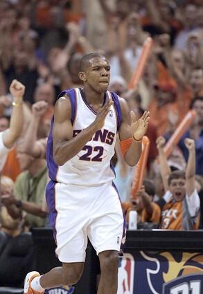 Phoenix Suns fans react as James Jones sinks a three-pointer giving the Suns a 10 point lead over the Lakers in the first quarter in game 7 of the NBA Western Conference first round playoffs at the US Airways Center in Phoenix Saturday.