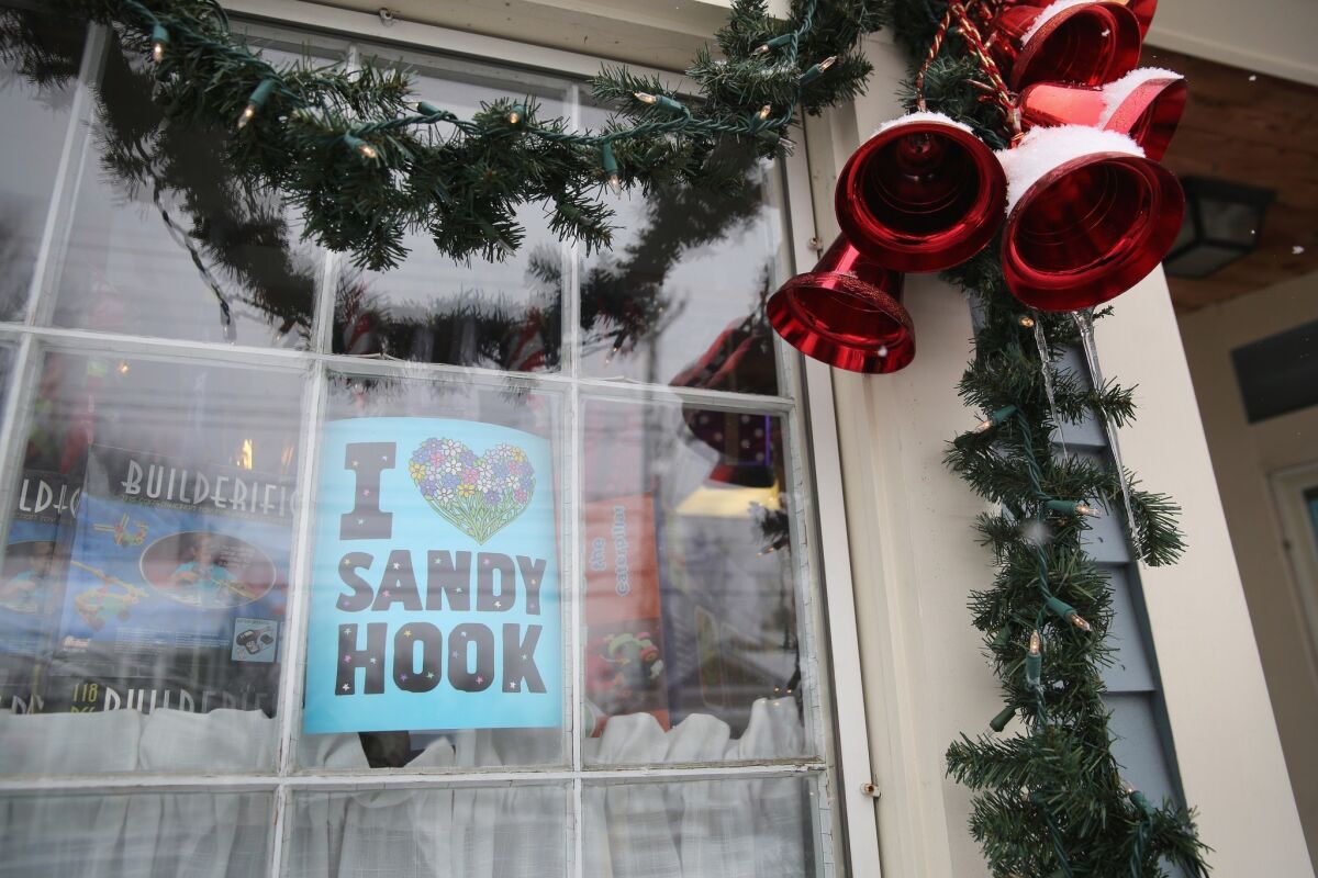 Christmas decorations adorn a business near the former site of Sandy Hook Elementary.
