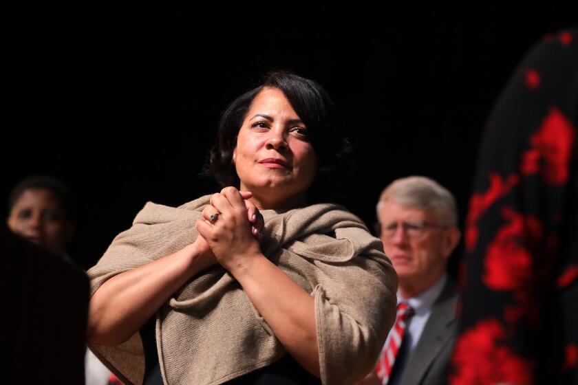 BOSTON, MA - JANUARY 2: Rachael Rollins listens to the closing selection by the Bethel A.M.E. Worship Team during her swearing-in as the new Suffolk County District Attorney at the Roxbury Community College Media Arts Center in Boston on Jan. 2, 2019. (Photo by Pat Greenhouse/The Boston Globe via Getty Images)