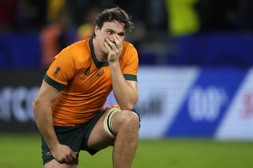 Australia's Tom Hooper reacts during the Rugby World Cup Pool C match between Wales and Australia at the OL Stadium in Lyon, France, Sunday, Sept. 24, 2023. Wales won the match 40-6. (AP Photo/Christophe Ena)