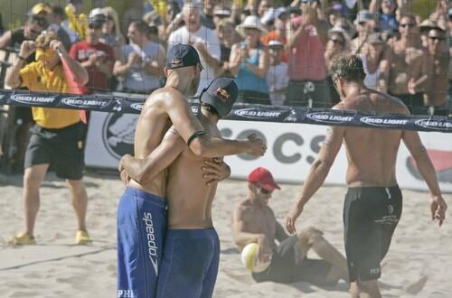Phil Dalhausser and Todd Rogers embrace after vanquishing Nick Lucena and Sean Scott in the AVP Manhattan Beach Open men's final on Sunday.