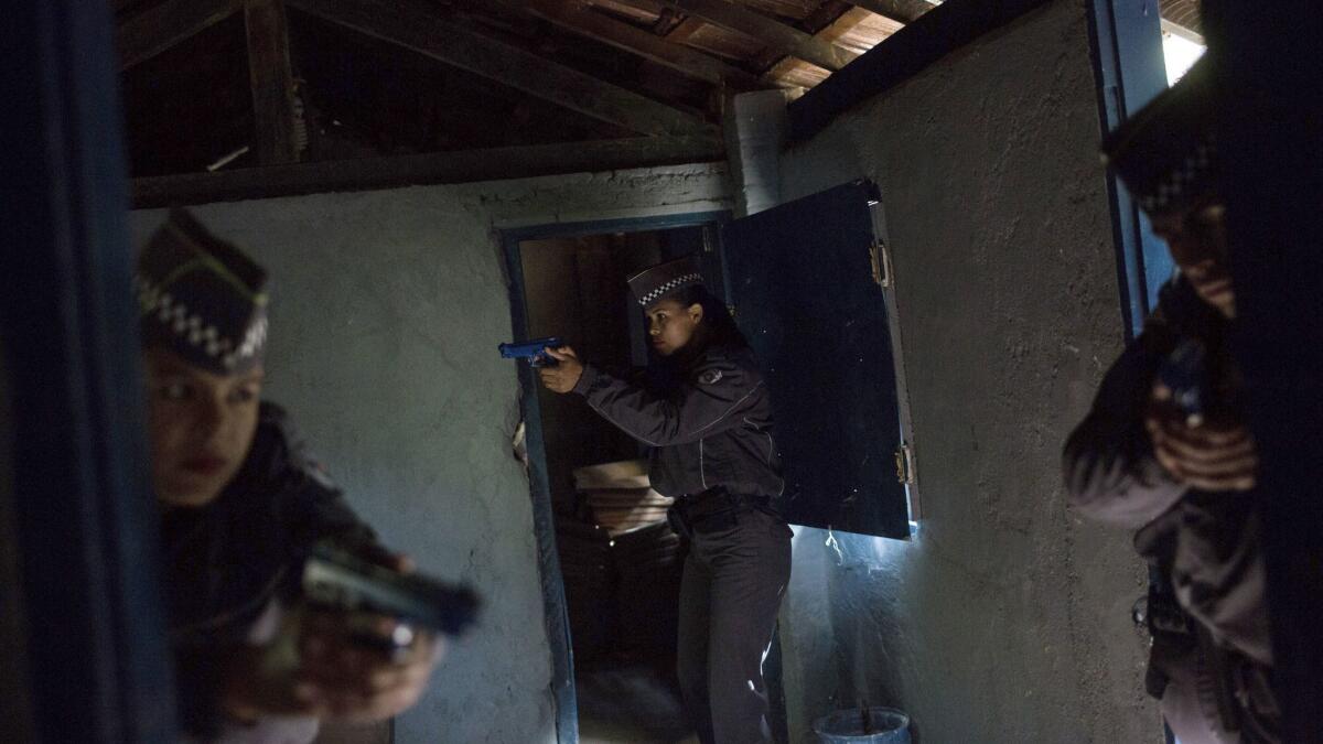 At Sao Paulo's Superior School for Soldiers, cadets clear a room during training.