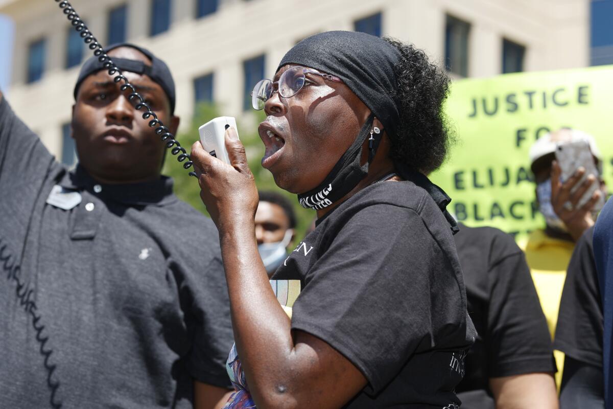 In this June 27, 2020 photo, Sheneen McClain speaks during a rally and march over the death of her son, Elijah McClain.