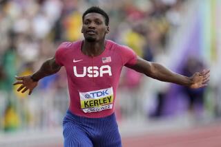 Fred Kerley, of the United States, wins the final in the men's 100-meter run.