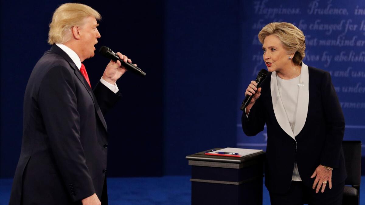 Is it worth bringing politics into the conversation at a family event when the topic is bound to cause friction? Above, presidential nominees Donald Trump and Hillary Clinton face off during their second debate at Washington University in St. Louis last month.