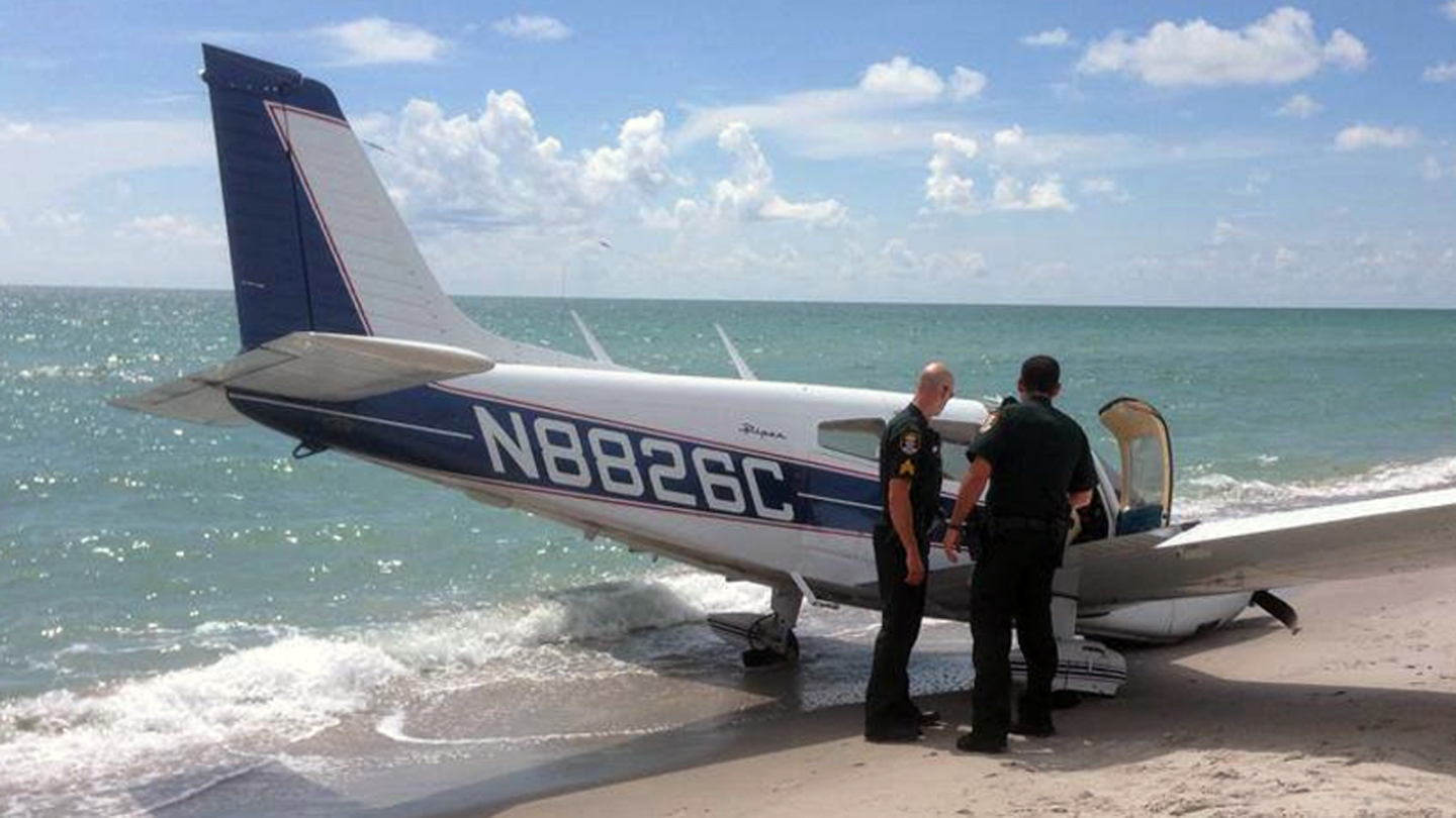 Small plane crash-lands on beach