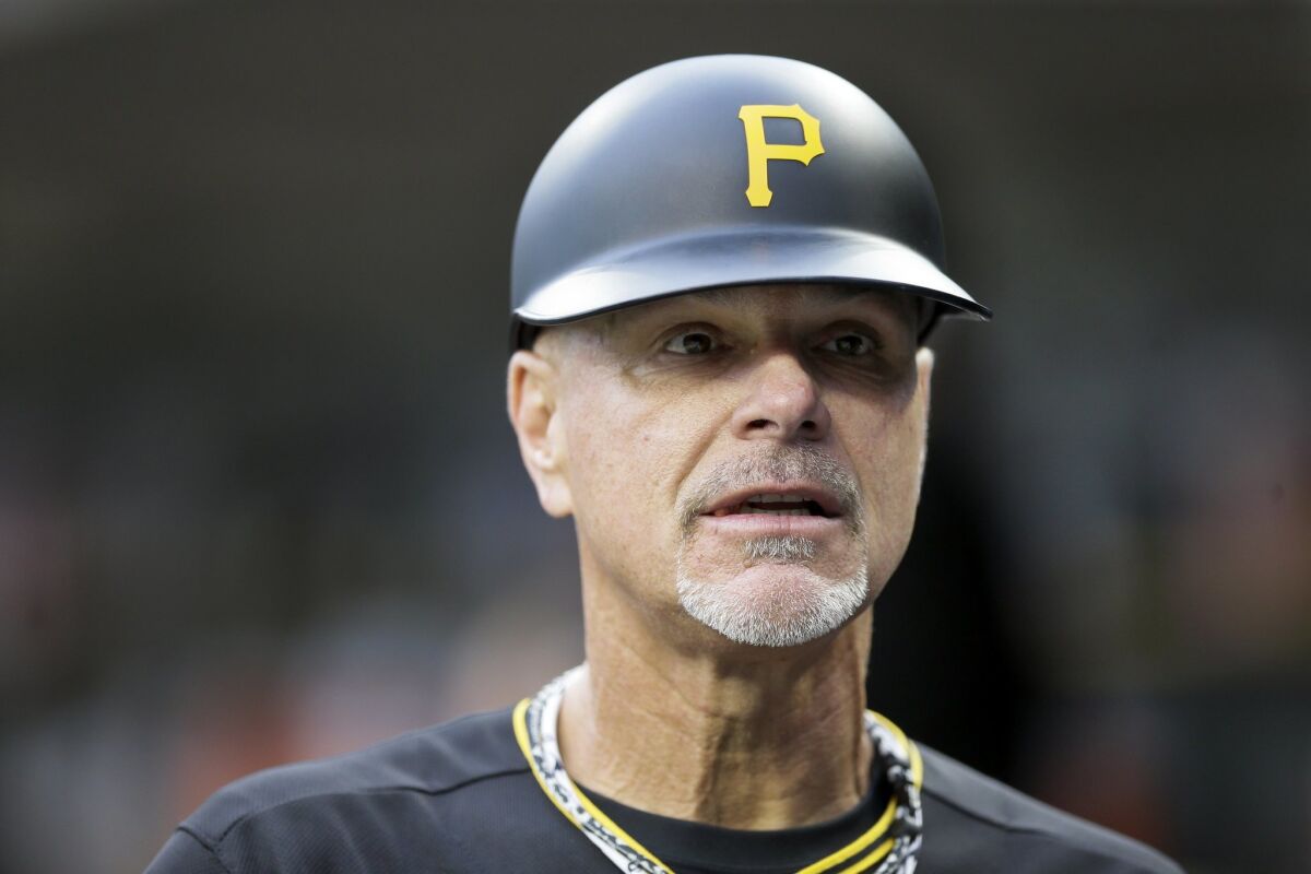 Pirates third base coach Rick Sofield is seen in the dugout during the first inning of a baseball game against the Detroit Tigers, Tuesday, June 30, 2015, in Detroit.
