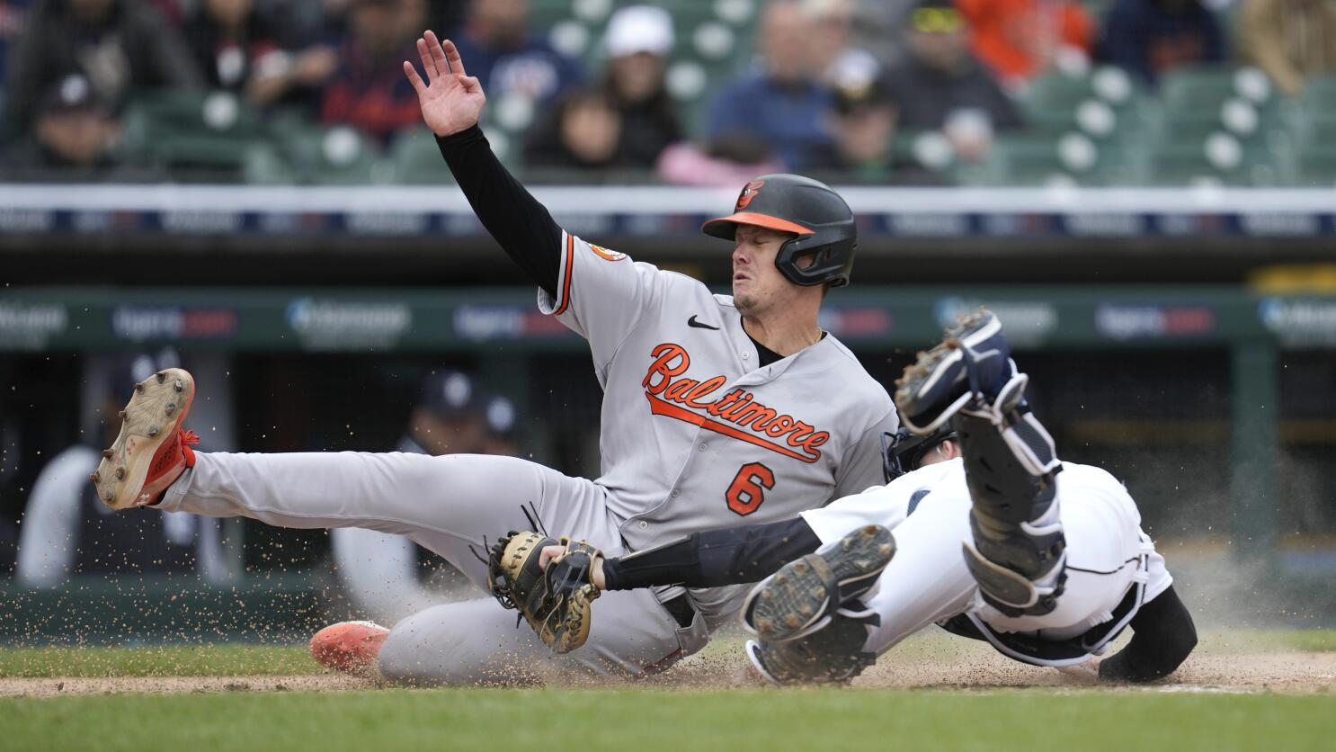 Matt Vierling of the Detroit Tigers slides safely into home plate