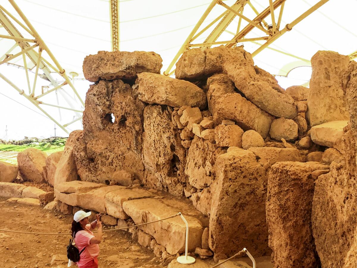 Prehistoric temple of Mnajdra is a megalithic temple complex found on the southern coast of the Mediterranean island of Malta. Mnajdra was built around the fourth millennium BCE.