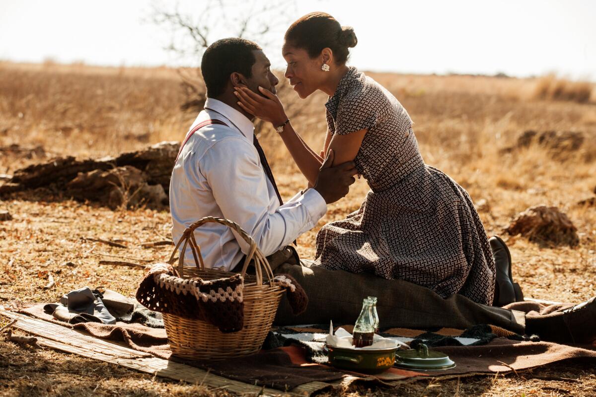 Idris Elba, as Nelson Mandela and Naomie Harris as Winnie Mandela in a scene from "Mandela: Long Walk to Freedom."