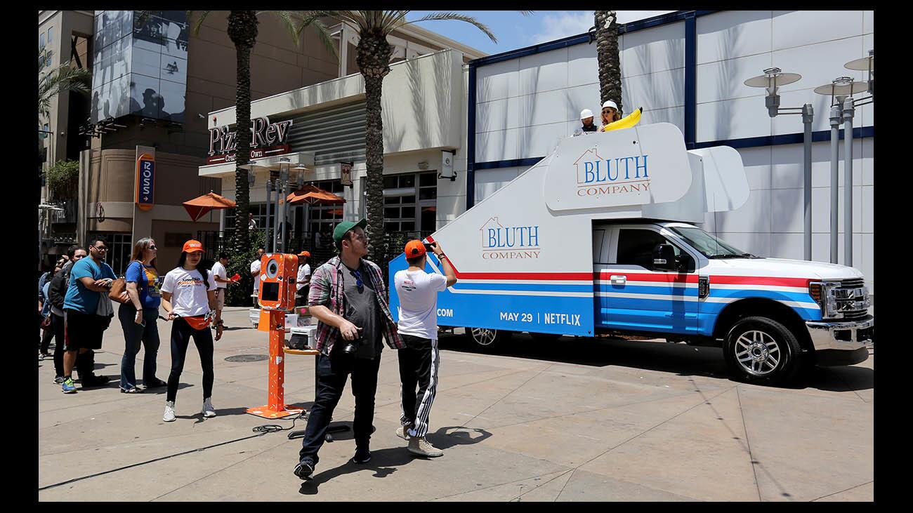 People got a chance to take a photo on top of the Bluth Company truck from Arrested Development during tour stop at the downtown Burbank Ben & Jerry"s, on Thursday, May 17, 2018. The show kicks off a new season May 29th on Netflix.
