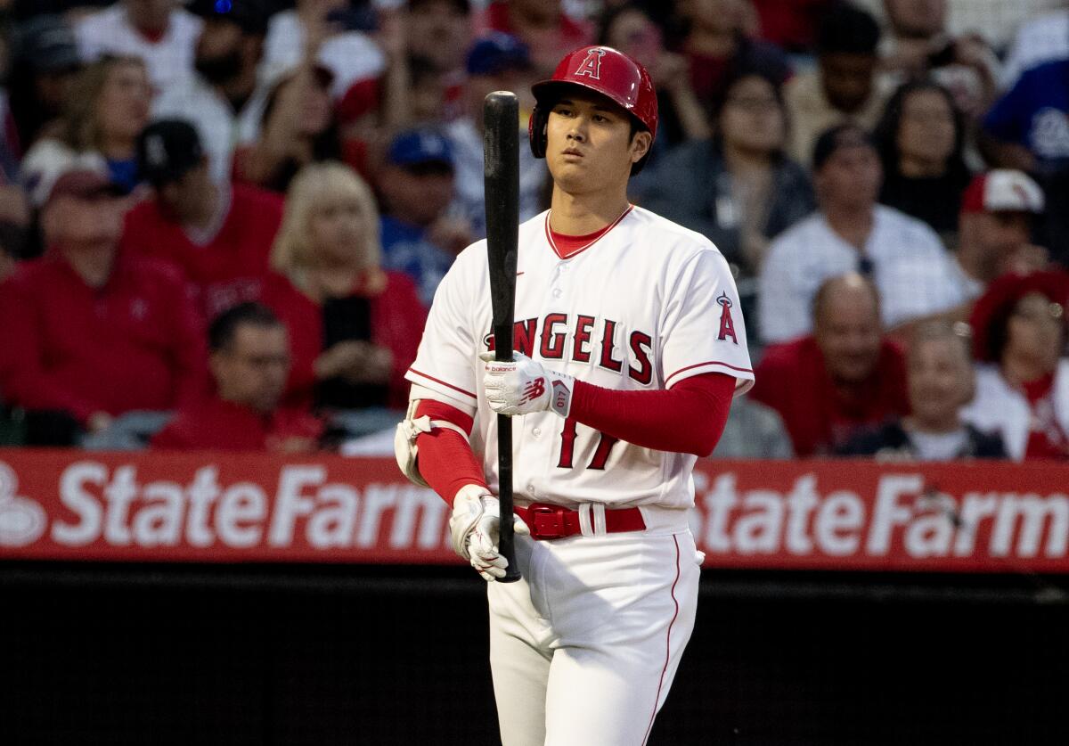 Angels designated hitter Shohei Ohtani walks to the plate.