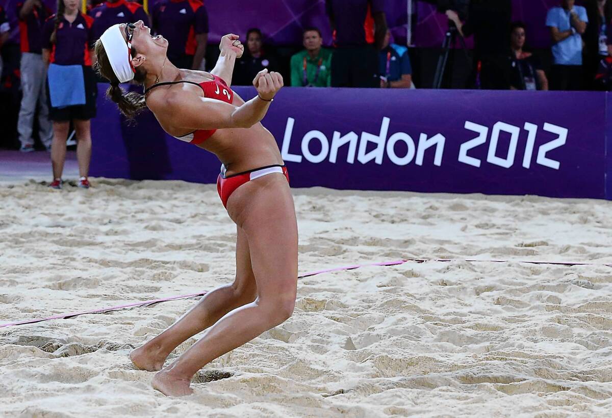 Misty May-Treanor lets out a celebratory scream after winning her third straight Olympic gold medal in beach volleyball on Wednesday in London.