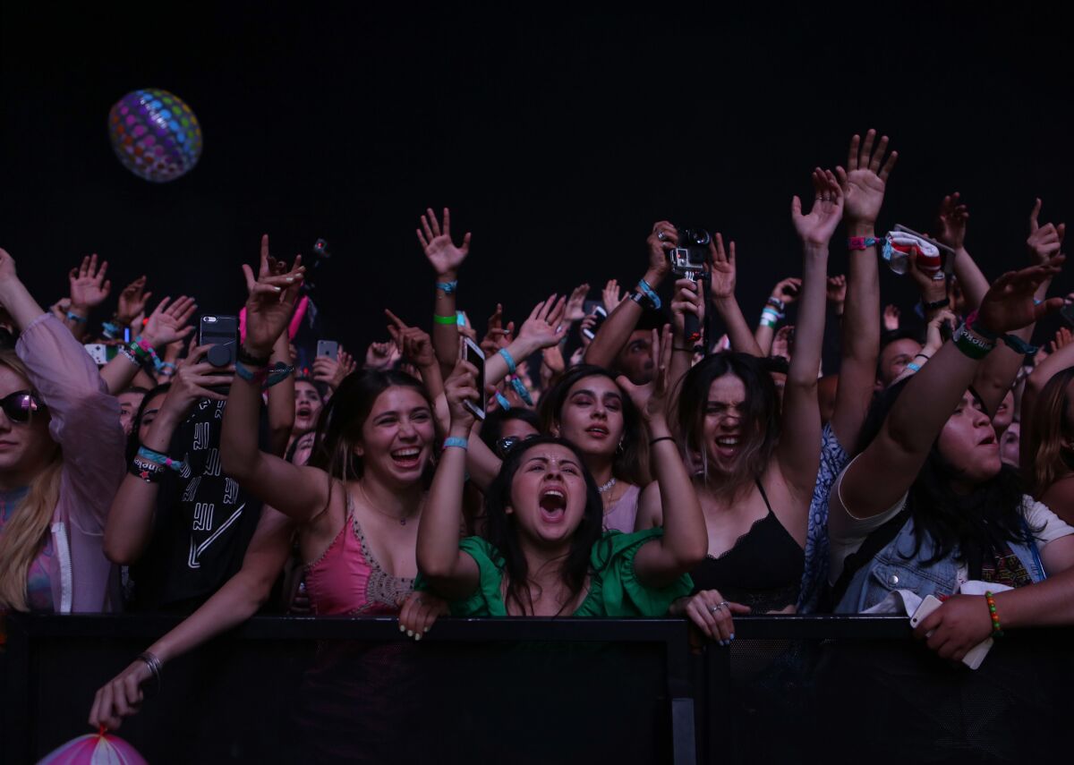 Fans await the arrival of DJ Calvin Harris in April at the 2016 Coachella Valley Music and Arts Festival in Indio. A Nielsen Music survey has found that consumers spend more money on live music events than any other way of experiencing music.