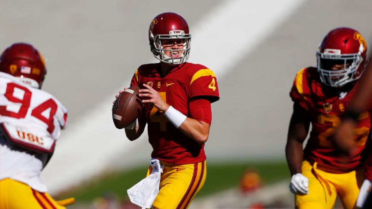 USC quarterback Max Browne looks to downfield for a receiver.