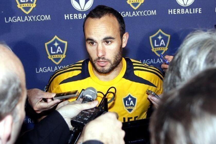 Galaxy star Landon Donovan talks with reporters at a news conference during the MLS Cup playoffs.