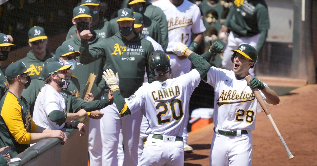 Canha sticks it to team he grew up rooting for in A's win