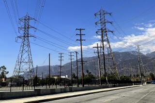 FILE - Electrical grid towers are seen during a heat wave where temperature reached 105 degrees Fahrenheit, in Pasadena, Calif., on Aug. 31, 2022. On Wednesday, March 27, 2024, California regulators released a proposal that would change how utility bills are calculated. Regulators say this could help control price spikes during the hot summer months. (AP Photo/John Antczak, File)
