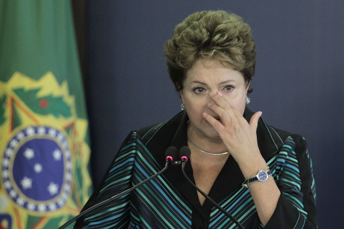 Brazilian President Dilma Rousseff cries during the release ceremony of the National Truth Commission Report in Brasilia on Wednesday.