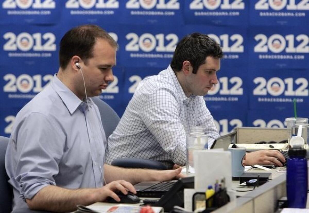 Staffers work at President Obama's reelection campaign headquarters in Chicago in May.