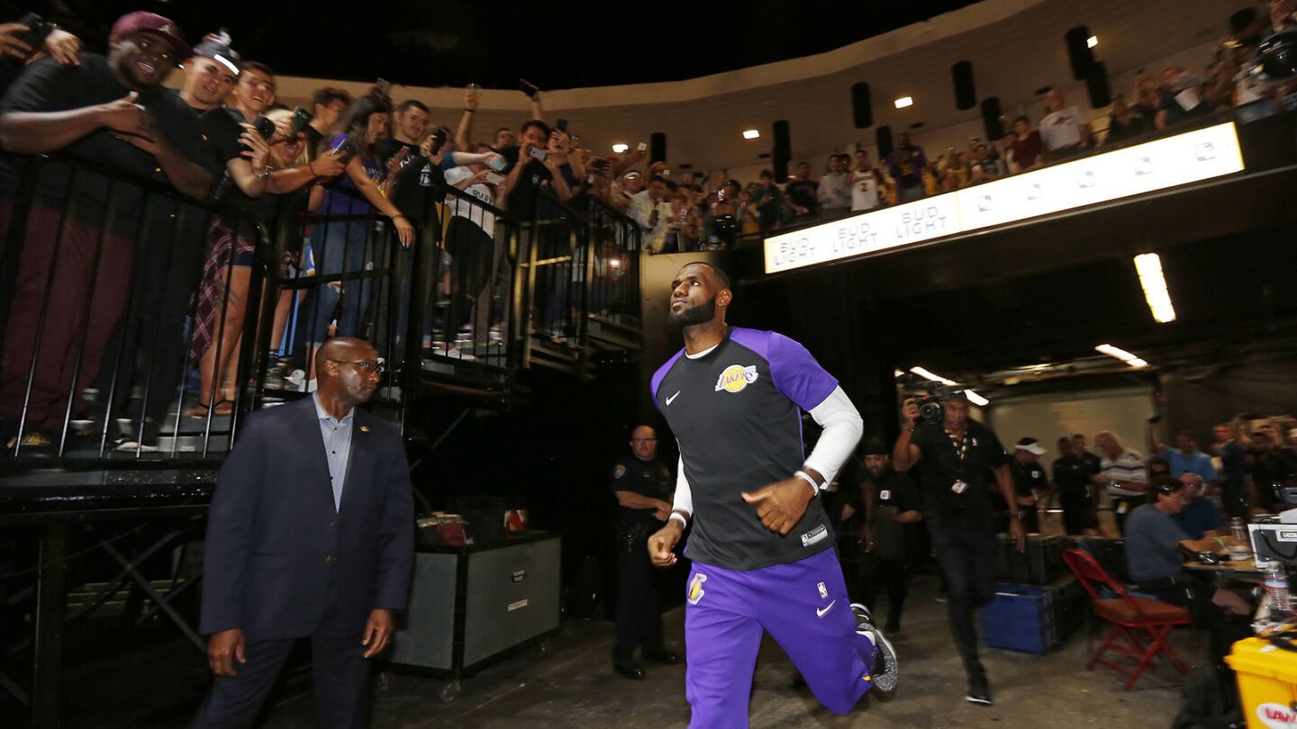 Los Angeles Lakers LeBron James runs out to the court for a game against the Denver Nuggets in San Diego on Sunday, September 30, 2018. (Photo by K.C. Alfred/San Diego Union-Tribune)