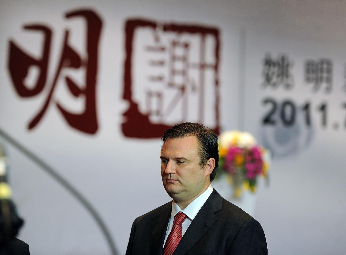 Houston Rockets general manager Daryl Morey attends Yao Ming's retirement news conference in China in 2011.