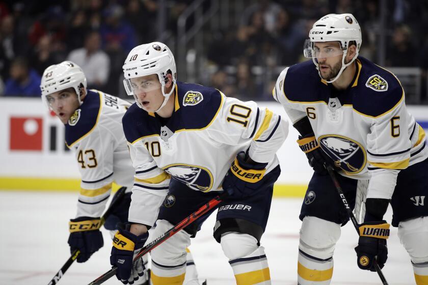 Buffalo Sabres' Conor Sheary (43), Henri Jokiharju (10) and Marco Scandella (6) wait for a face off during the second period of an NHL hockey game against the Los Angeles Kings Thursday, Oct. 17, 2019, in Los Angeles. (AP Photo/Marcio Jose Sanchez)