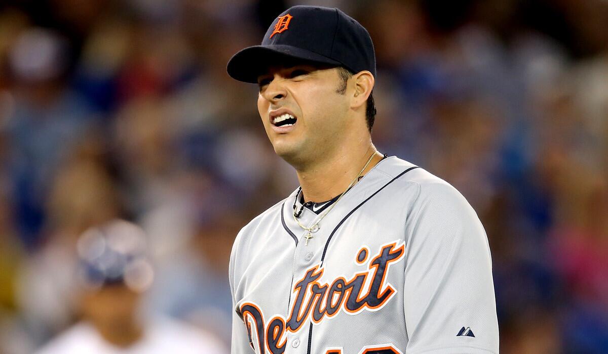 Tigers starting pitcher Anibal Sanchez grimaces as he exits a game in Toronto on Friday night because of an injury.