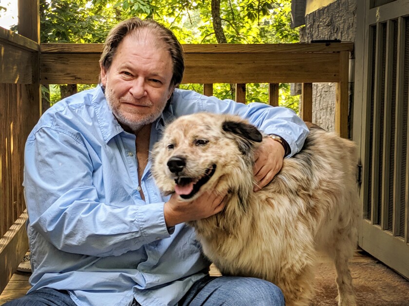 Pulitzer Prize-winning journalist and author Rick Bragg sheltering in Alabama with his dog, Speck.