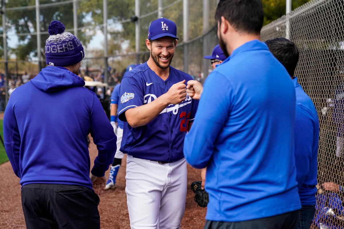 Dodgers pitcher Clayton Kershaw smiles after throwing during live batting practice at spring training on Feb. 23.