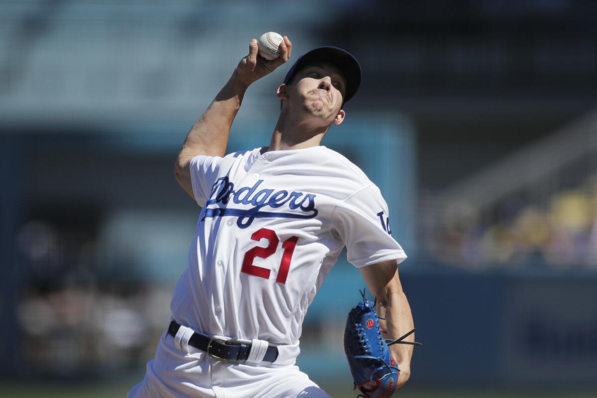 Dodgers pitcher Walker Buehler didn't allow a Rockies baserunner during the first two innings.