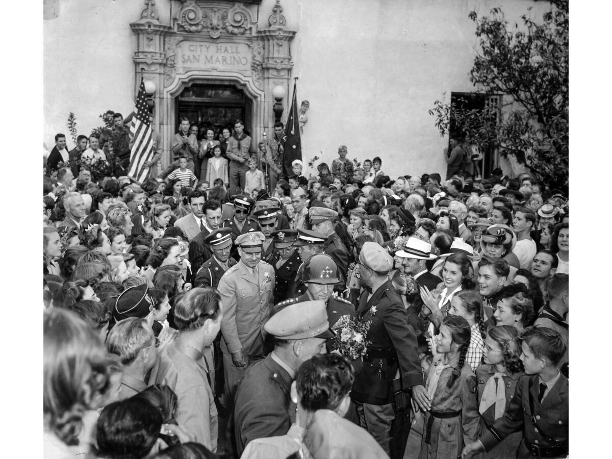 June 10, 1945: Gen. George S. Patton Jr. leads Lt. Gen. James Doolittle out of San Marino City Hall after welcome home ceremonies. Patton was born in San Marino on Nov. 11, 1885.