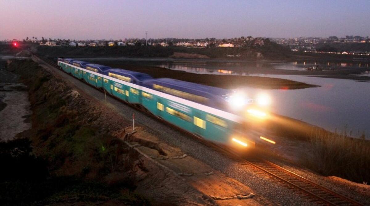 A northbound Coaster train crosses the Batiquitos Lagoon between Encinitas and Carlsbad.