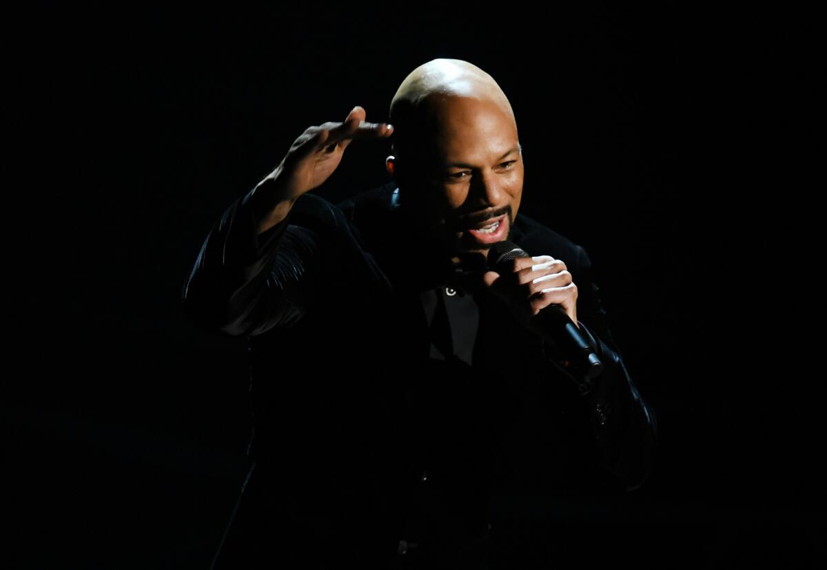 Common performs onstage during the 90th Annual Academy Awards.
