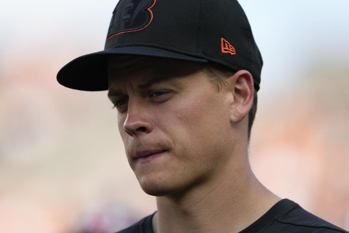 Quarterback Joe Burrow watches the Cincinnati Bengals preseason game against the Rams.