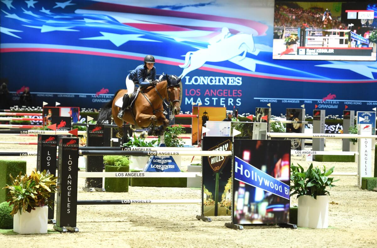Reed Kessler rides Cos I Can during the Longines Grand Prix class on Sunday