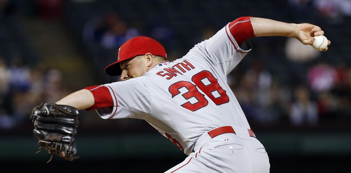 Angels reliever Joe Smith pitches during the eighth inning of a game against the Texas Rangers on April 13.