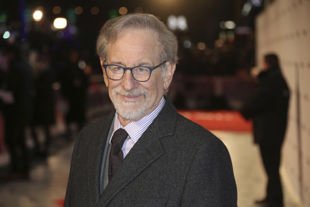 FILE - Director Steven Spielberg poses for photographers upon arrival at the premiere of the film "The Post" in London, Wednesday, Jan. 10, 2018. Spielberg is bringing his highly personal film ‘The Fabelmans’ to the Toronto International Film Festival this fall, organizers said Friday, July 22, 2022. (Photo by Joel C Ryan/Invision/AP, File).