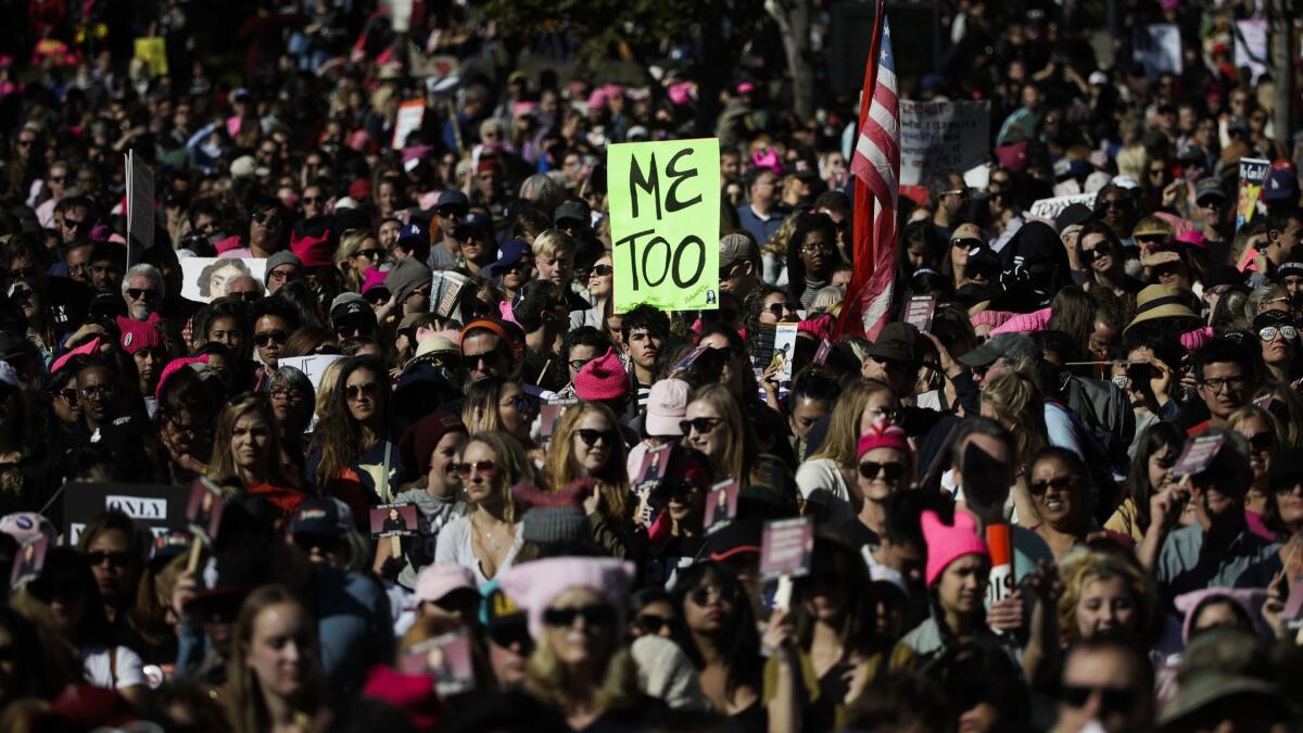 Protesters gather at Grand Park in downtown Los Angeles in January 2018 to rally against sexual violence, among other issues.