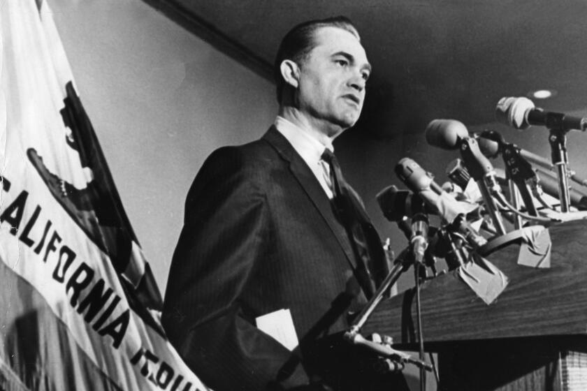 Then-Gov. George Wallace of Alabama speaks at a press conference held in Santa Monica in January 1968.