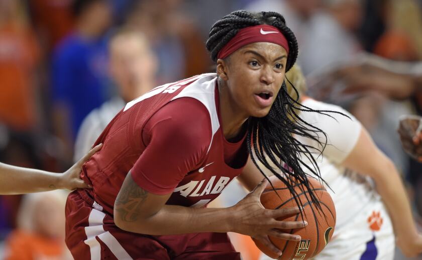 Alabama's Jasmine Walker receives a pass