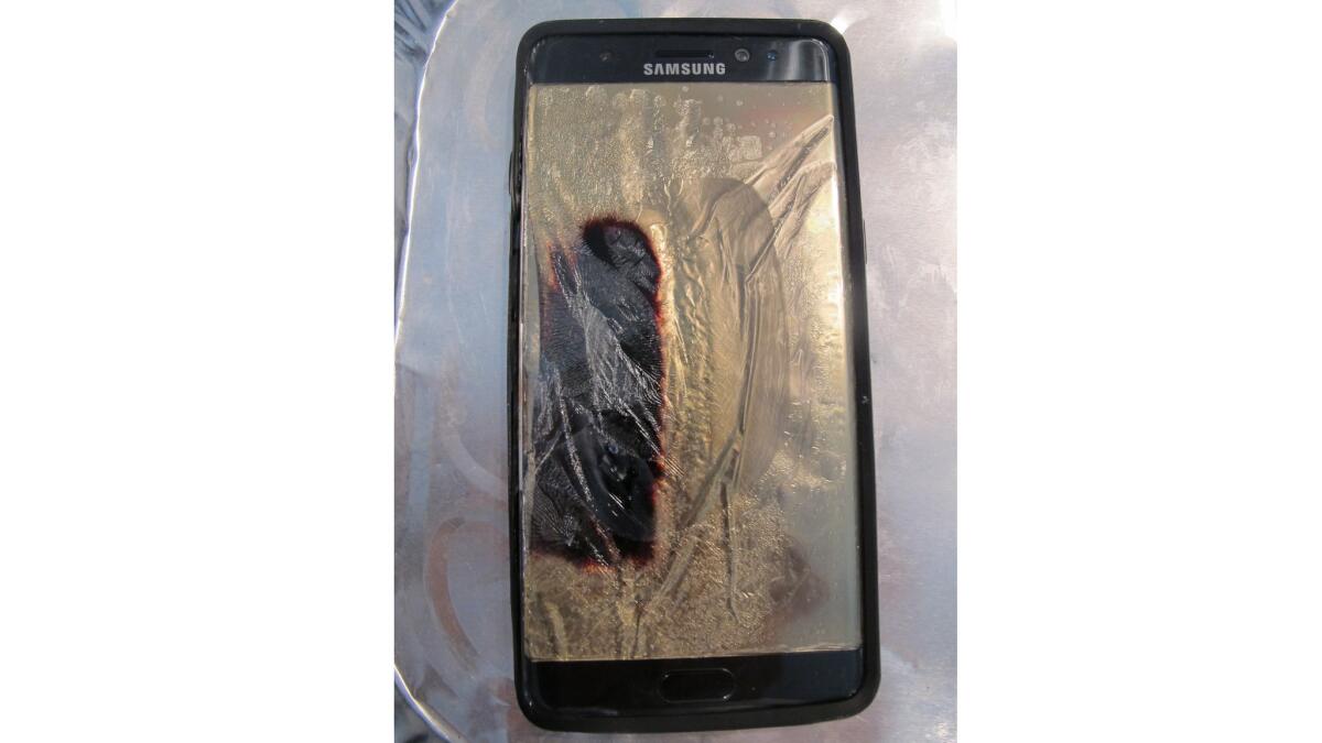 This photo taken in Honolulu shows a replacement Galaxy Note 7 smartphone after the phone released smoke and sizzled.