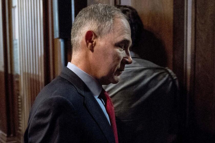 Environmental Protection Agency Administrator Scott Pruitt departs following a news conference at the Environmental Protection Agency in Washington, Tuesday, April 3, 2018, on his decision to scrap Obama administration fuel standards. (AP Photo/Andrew Harnik)