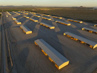 Structures storing alfalfa at Fondomonte's farm in Vicksburg, Ariz.
