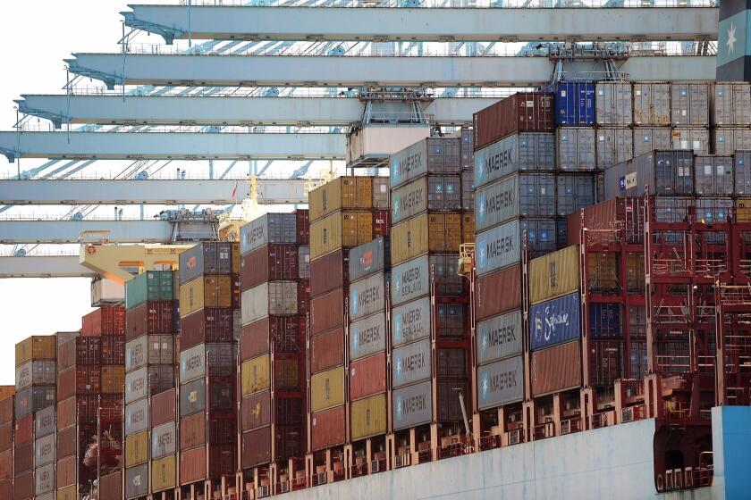 LOS ANGELES-CA-APRIL 20, 2016: Stacks of containers aboard the Maersk Edmonton, one of the two biggest ships, are unloaded at APM Terminals in the Port of Los Angeles on April 19, 2016. (Christina House / For The Times)