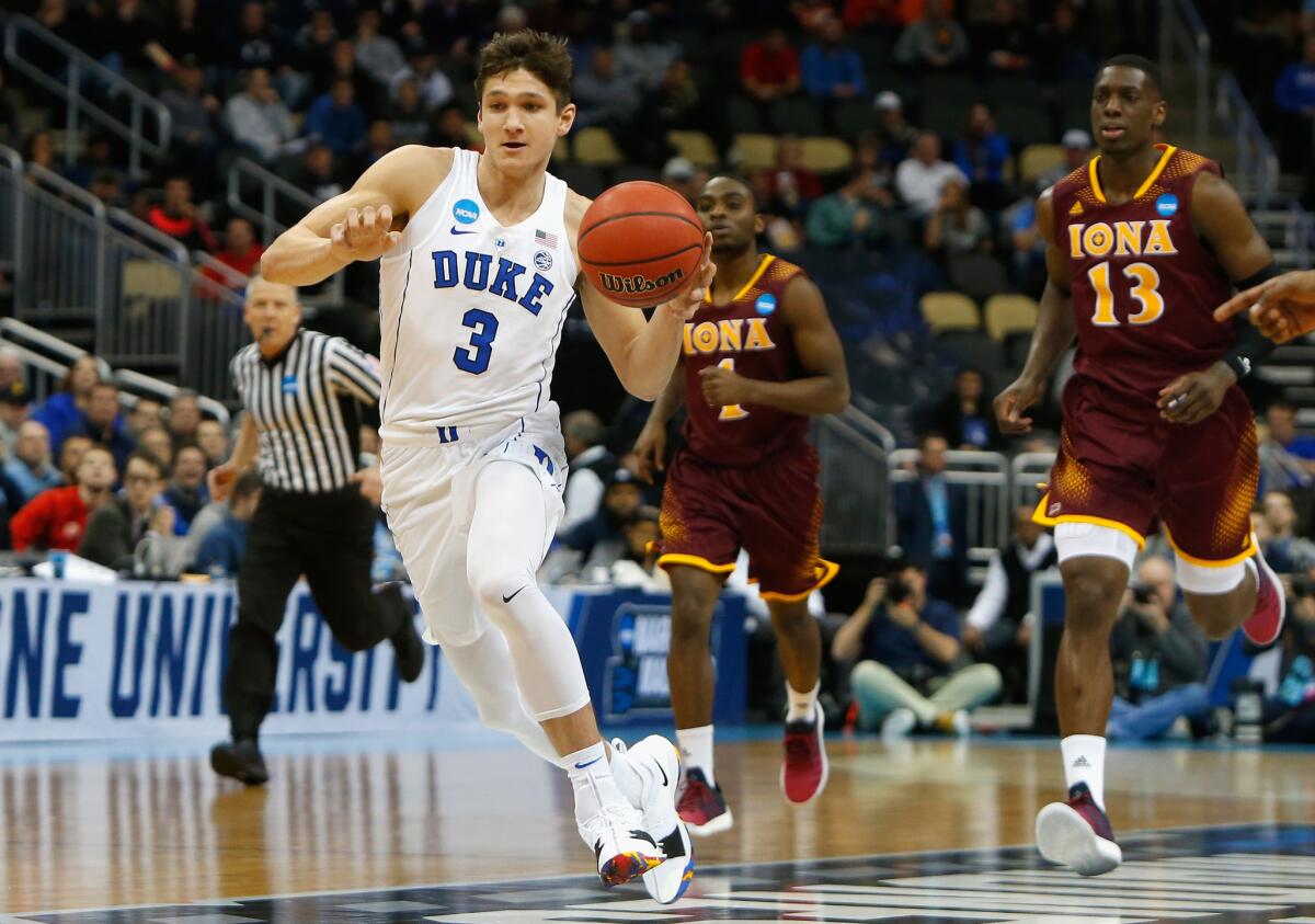 Duke's Grayson Allen (3) controls the ball against Iona during the first half of the game in the first round of the NCAA tournament.
