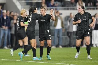 Angel City FC forward Christen Press (23) celebrates with midfielder Savannah McCaskill (9) after Press scored a goal during the second half of an NWSL soccer match against the Kansas City Current in Los Angeles, Saturday, May 21, 2022. (AP Photo/Ashley Landis)