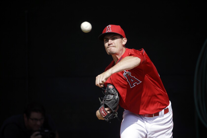 Angels pitcher Andrew Heaney throws during a spring training workout.