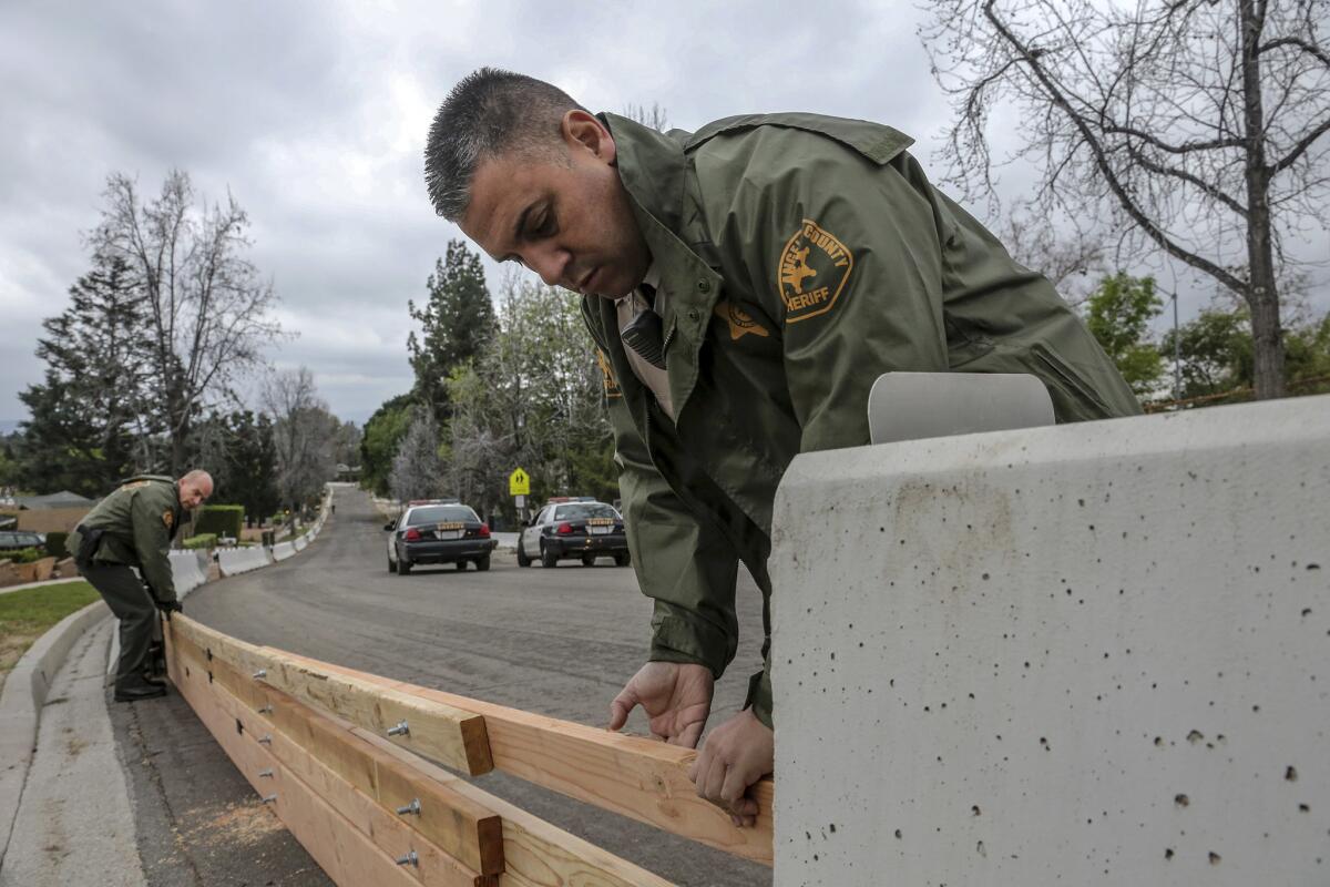 Deputies put up barriers in Duarte Friday afternoon