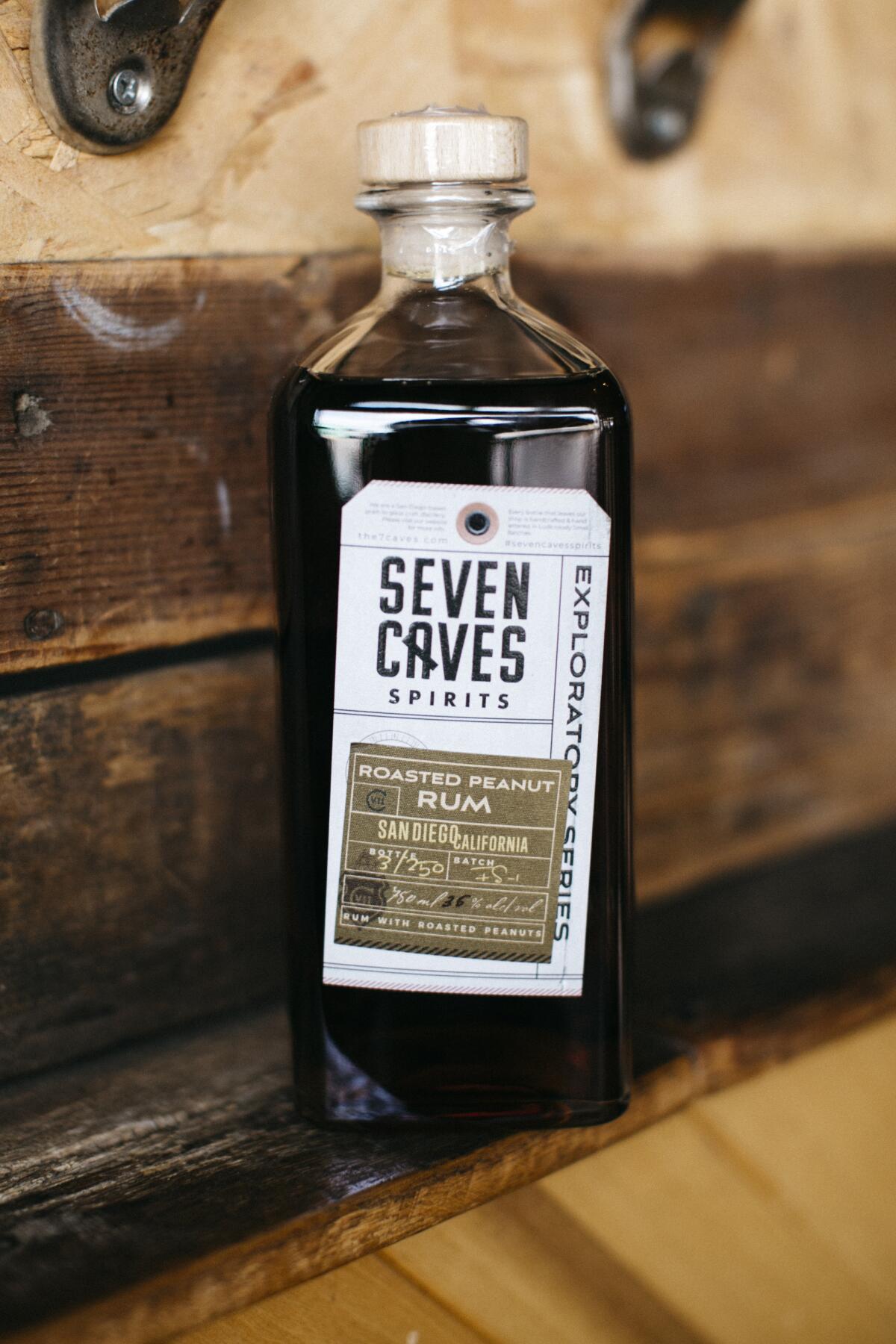 A bottle of roasted peanut rum from Seven Caves Spirits.